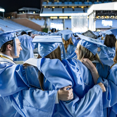 Students wearing graduation regalia